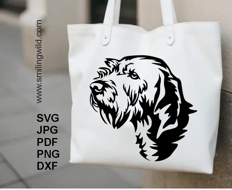 a white tote bag with printed applique of Digital graphic of Basset Fauve de Bretagne dog – SVG, PNG, DXF files for Cricut or laser design