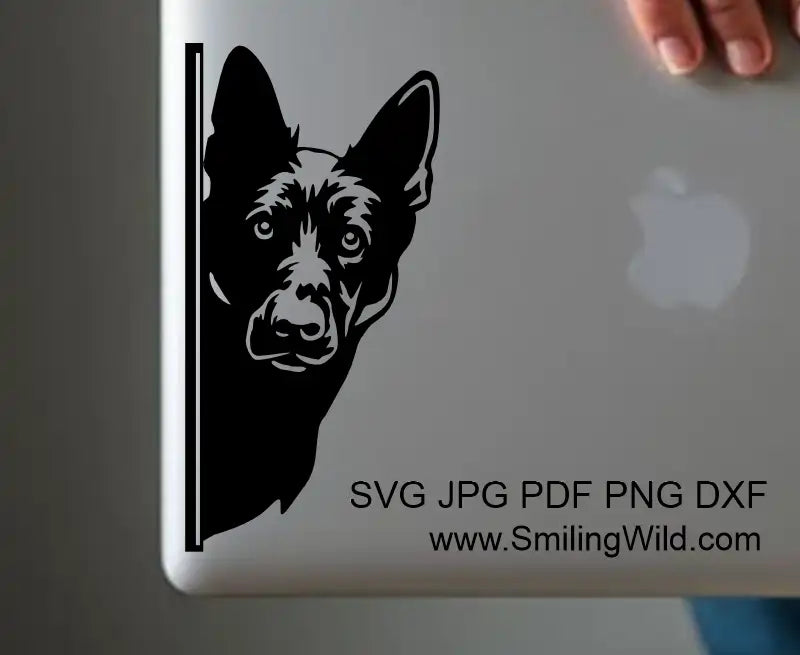 Peeking black German Shepherd dog SVG PNG DXF vector graphic for laser cutting, Cricut, and craft applications is a great laptop design