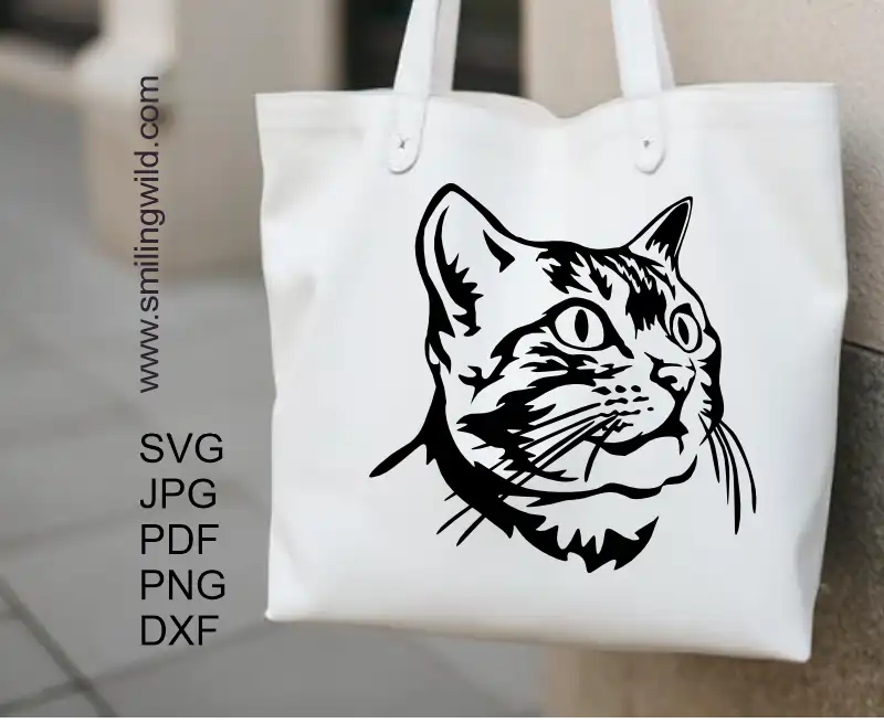 Tote bag design made of Black vector Bengal cat head SVG file thatis useful for vinyl cutting, etching, and crafting machines
