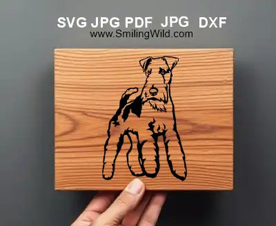 Wooden block with fox terrier dog head portrait dxf illustration held by a hand for wood engraving crafts.