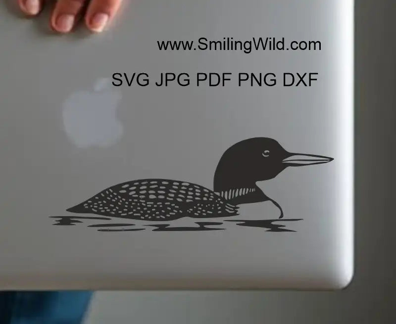Loon bird black clipart in SVG, PNG & DXF, perfect for laser engraving, vinyl, and craft projects represented as a laptop sticker