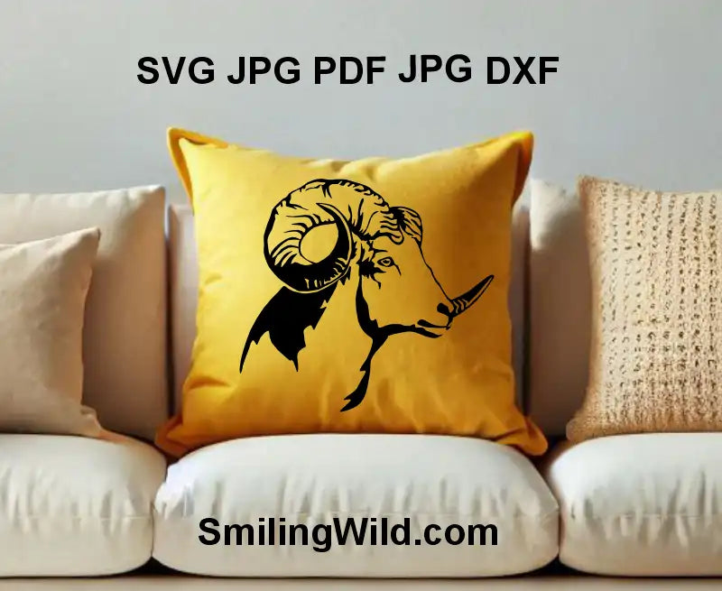 A pillow with a decorative decal featuring Dall Sheep Head vector – perfect for Glowforge, xTool, and rustic home décor