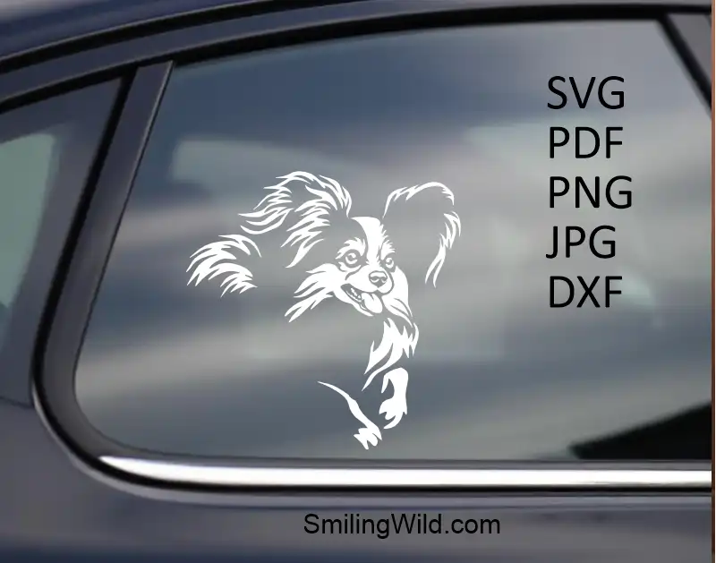 a car window with a White running Papillon dog sticker made of vector svg or DXF of for engraving and cutting