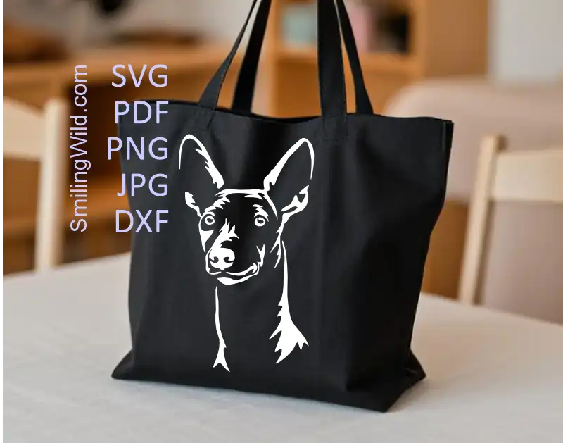 a tote bag with an application of a Cirneco dell’Etna svg, png and DXF cuttable graphic for dark crafts and signs