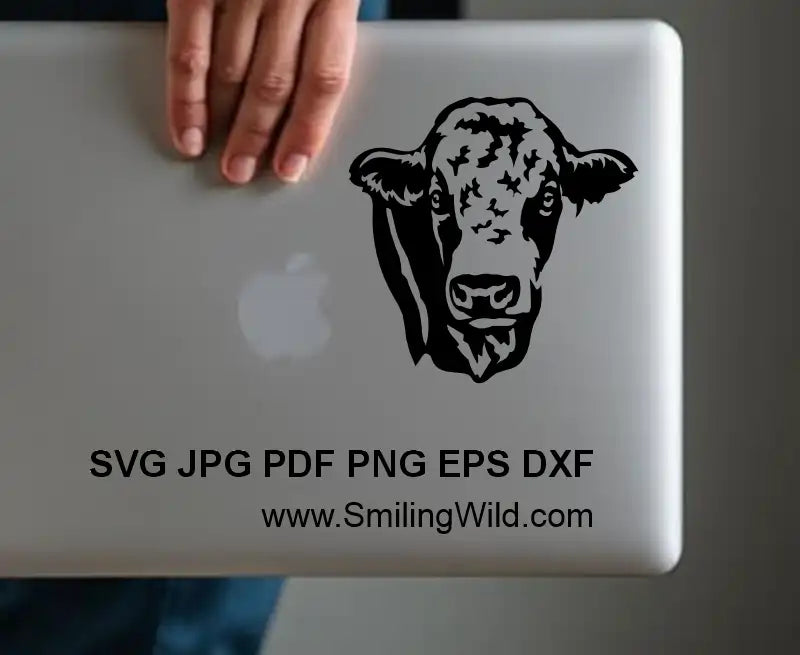 Laptop with a Simmental cow head decal made of svg png dxf clipart design