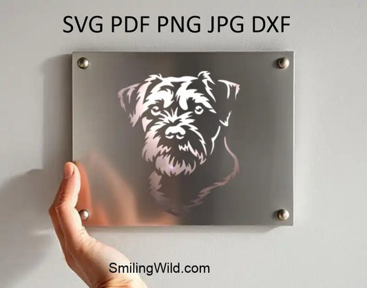 ametal engraving design showing a Realistic white vector design of Border Terrier face – DXF cut file for engraving & crafts