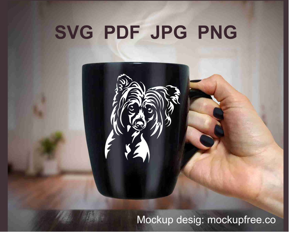 A hand with a black mug with chinese crested white design application on it