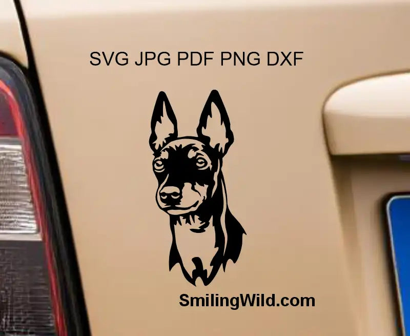 A car decal presenting an English Toy Terrier SVG and DXF Vector Clipart applied to an item, emphasizing the elegant profile of the dog head design.