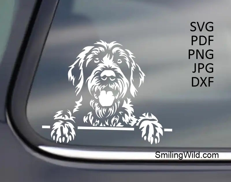 the Korthals Griffon Dog White Clipart applied to a black car window, demonstrating the design's visibility and quality for white vinyl decals.