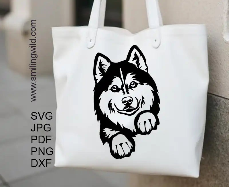 a tote bag design made of a Peeking Husky clipart cut file in SVG, PNG, DXF for crafting and engraving.