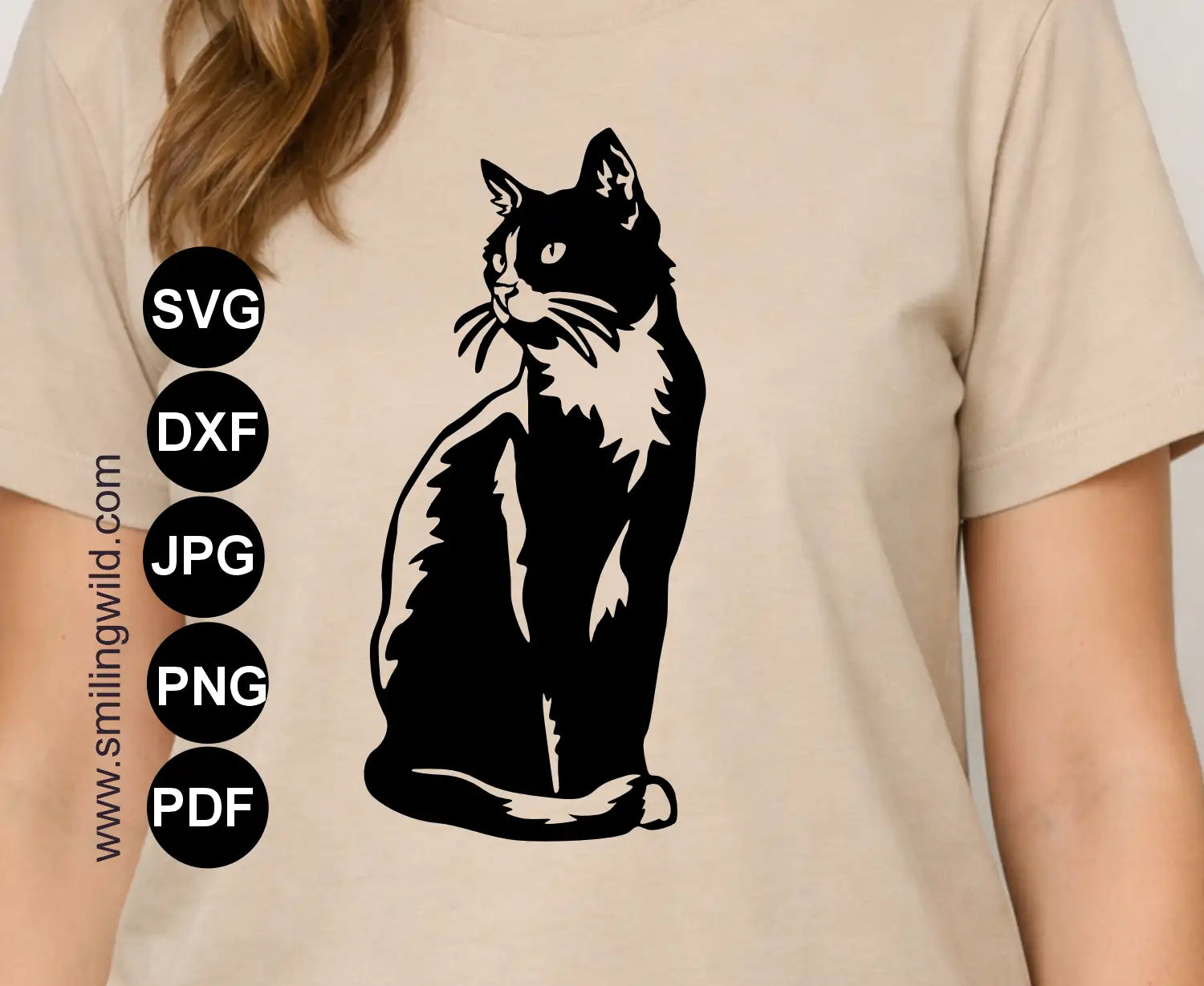 A full body sitting tuxedo cat SVG cutting file presentation on a t shirt as a vinyl decal 