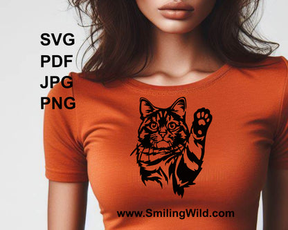 tabby cat with raised paw is printed on orange t shirt